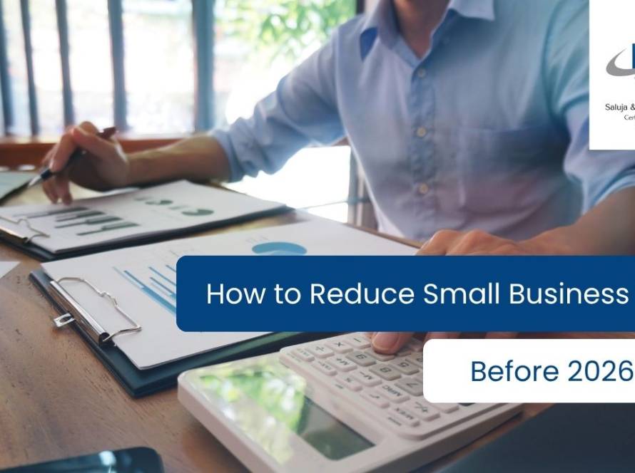 Houston small business owner reviewing 2026 tax planning strategies, deductible expenses, and financial records with a CPA.